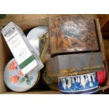 A box containing a large quantity of vintage tins
