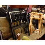 Two black painted framed directors' style folding chairs - sold with another similar