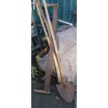 Two antique scythes - sold with an old Devon shovel and pit saw