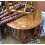 A 70cm diameter early 20th Century walnut occasional table, set on square tapered supports and