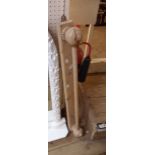 An old stripped pine wall mounted towel rail