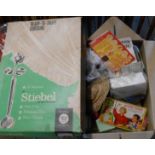 A box containing a quantity of assorted sewing related items including ribbons, pin cushions, etc. -