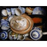 A box containing assorted ceramic items including a Leaper Newlyn dish, blue and white cups and