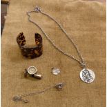 A vintage whistle with inset compass - sold with a 1913 football medallion, a silver nugget pendant,
