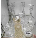 A selection of cut and other glassware including candlesticks, preserve pots, etc.