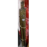 A quantity of Victorian brass stair rods of rope and candy twist form with flame twist terminals -