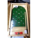 A vintage Chad Valley miniature bagatelle board