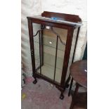 A 60cm vintage stained wood display cabinet with material lined interior and glass shelves, set on