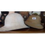 An old pith helmet - sold with a smaller similar