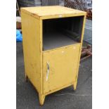 A vintage yellow painted metal cabinet - drawer missing