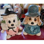 Two novelty ceramic cookie jars containing a quantity of cereal, crisp packet, etc. giveaway items