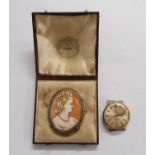 A vintage Rotary 9ct. gold wristwatch - winder a/f - sold with a large oval cameo brooch