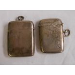 Two silver vesta cases, one with engraved decoration, both with initials