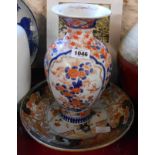 A 19th Century Japanese Imari dish with old rivet repairs - sold with a similar vase a/f