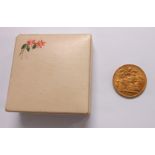 A boxed 1913 George V gold Sovereign