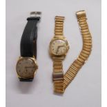 A vintage Tissot 9ct. gold cased cushion shaped wristwatch - sold with a Titus similar, both with