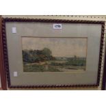 A. Shelley: a gilt framed watercolour, depicting a river landscape - signed and dated 1879