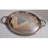 A 41cm silver oval tea tray with flanking cast handles - Sheffield 1969