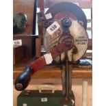 A vintage Elmo bench grinding wheel