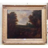 A gilt gesso framed large early/mid 19th Century continental oil on board, depicting a landscape