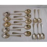A set of ten silver soup spoons and five silver dessert spoons, all with matching initials to