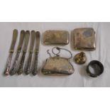 A silver bag pattern purse - sold with two silver cigarette cases, lid, napkin ring and silver