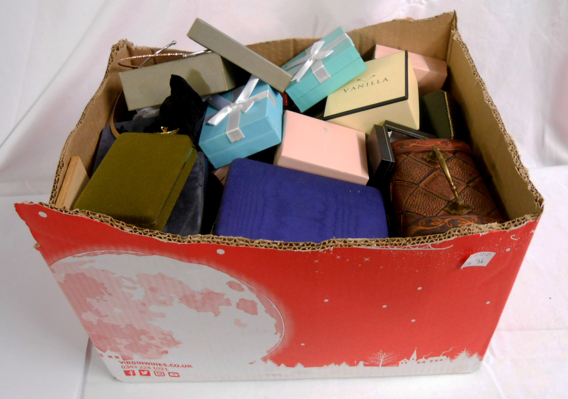 A box containing a collection of mainly Diamonique and other assorted boxed costume jewellery