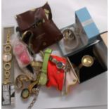 A bag containing a quantity of boxed and loose assorted modern wristwatches