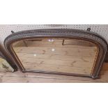 A 98cm late Victorian overmantel mirror with gilt bordered arched plate - pommels a/f
