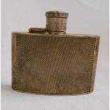 A silver flip-top hip flask of curved form with engine turned decoration