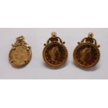 A pair of 9ct. gold pierced earrings and matching pendant, each set with a fantasy Republic of