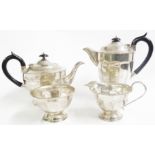 A silver four piece tea set of faceted design by Edward Viner - Sheffield 1959