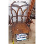 A good quality reproduction Windsor elbow chair with swept lattice hoopback and thick solid