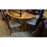 Two similar Edwardian stained wood and strung bedroom chairs both with studded upholstered seat