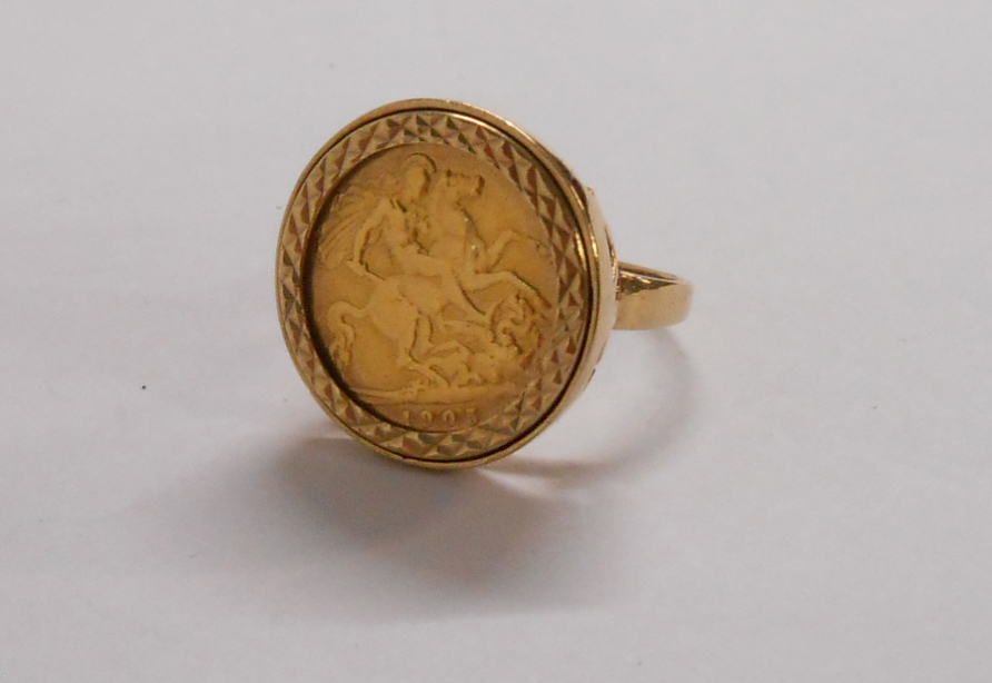 An Edward VII 1903 gold Half Sovereign loose mounted in a 9ct. gold ring shank