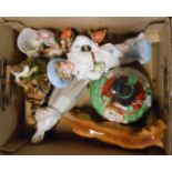 A box containing a quantity of assorted pottery figurines including Lomonosov, Hummel,
