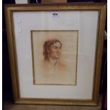 A gilt framed indistinctly signed portrait of a young man in pastels, dated 1913 - 31cm X 24.5cm