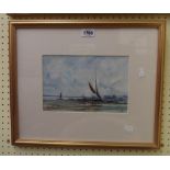 A gilt framed watercolour, depicting beached boats - indistinctly monogrammed
