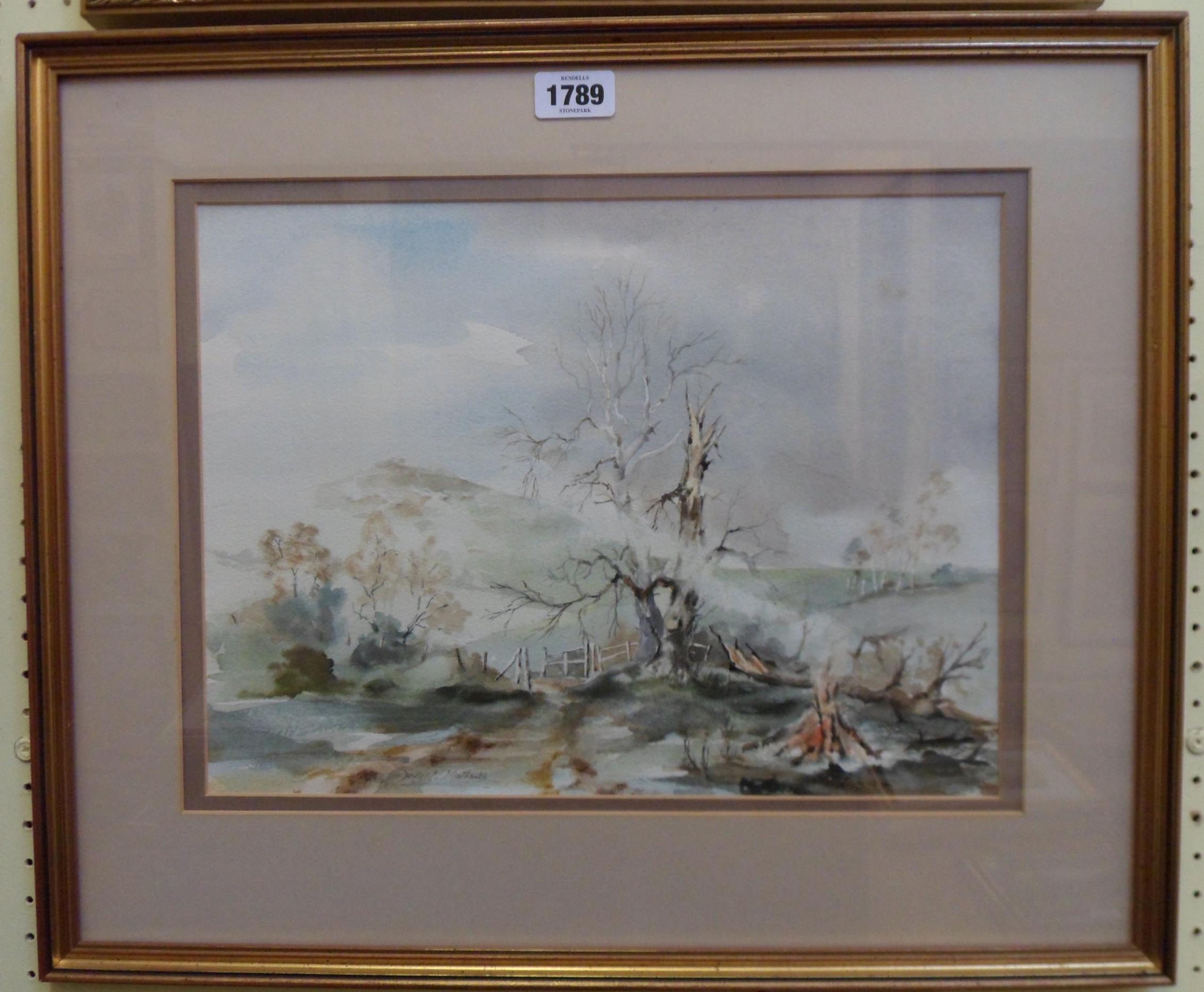 D. R. Matthews: a gilt framed watercolour entitled Aftermath, depicting a bleak landscape - signed