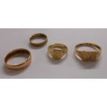 Three assorted 9ct. gold rings - sold with an unmarked yellow metal small shank signet ring