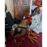 Two modern painted tin cockerel figurines