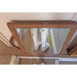 An old oak framed bevelled oblong mirror - sold with an oval mirror - both from dressing table