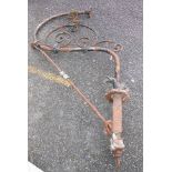 A late 19th Century cast and wrought iron wall mounted streetlamp bracket - by repute from a