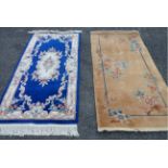 Two small modern machine made rugs