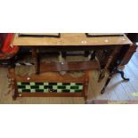 A 91cm Victorian stained walnut washstand with damaged tile inset splash back and marble top over