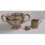 A small silver taper candlestick - sold with a white metal Anglo Indian mug (dents) and a Walker &