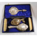 A cased silver mounted hand mirror and brush set - Birmingham 1919 - one brush and comb a/f. also