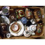 A box containing assorted ceramic items including a set of Staffordshire copper lustre graduated