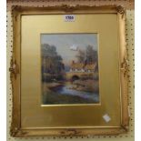 J. Hedley: a gilt framed and slipped watercolour, depicting a rural riverside building and