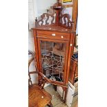 A 56cm Edwardian mahogany and strung freestanding corner cabinet with decorative pierced pediment